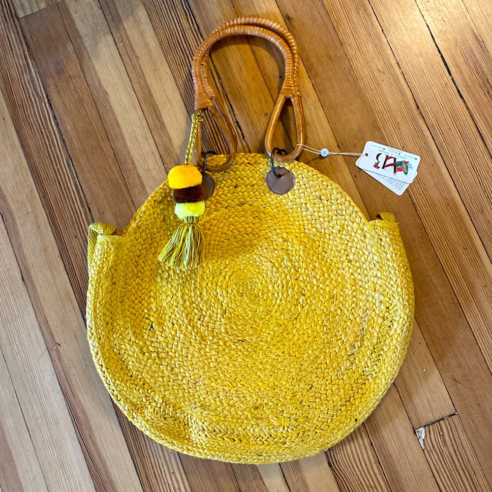 America and Beyond gold jute bucket bag with cane‎ handles and shoulder s…